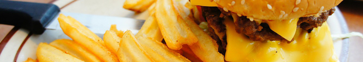 Eating Burger at Farm Burger Asheville restaurant in Asheville, NC.